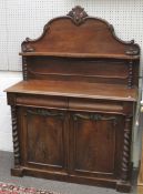 A Victorian mahogany two door chiffonier with shelf back.