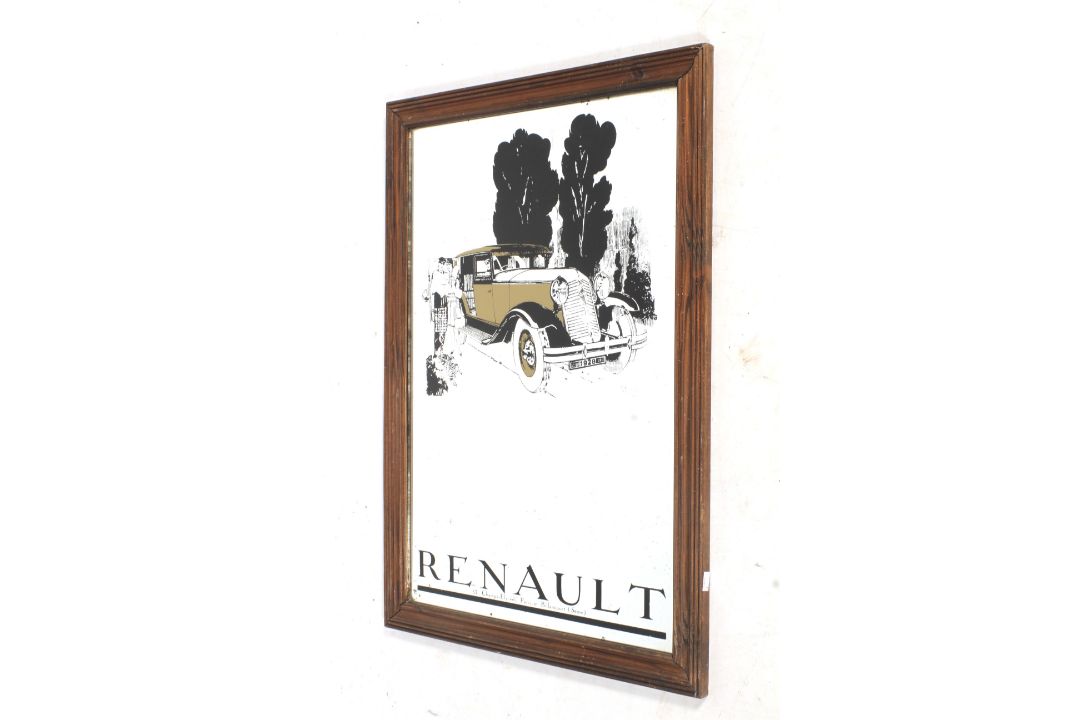 A vintage advertising mirror promoting 'Renault' cars.