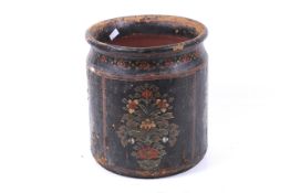 A vintage wooden jardiniere. Painted with floral decoration on a black ground, H30.