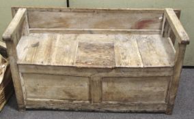 A late 19th century rustic pine monks bench.