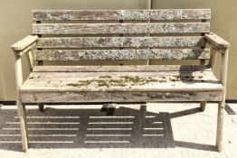 A slat-back garden bench.
