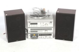 A late 20th century Toshiba hi-fi and speakers.