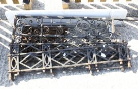 A collection of Victorian and later cast iron garden wall top panels or lawn edge screens and other