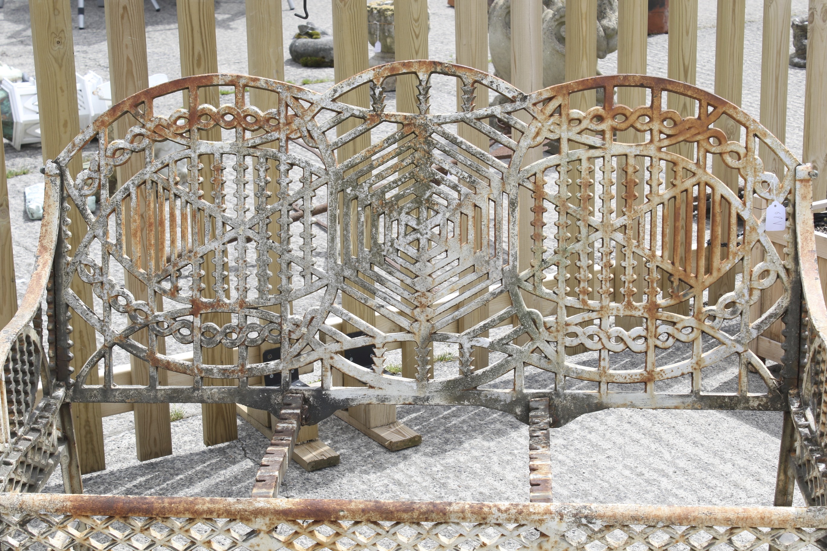 A mid 20th century cast iron garden bench designed by Edward Bawden for the Bilston Foundry. - Image 5 of 6