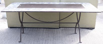 A large metal framed garden table.