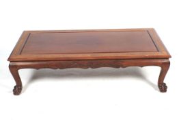 A 20th century Chinese low coffee table.
