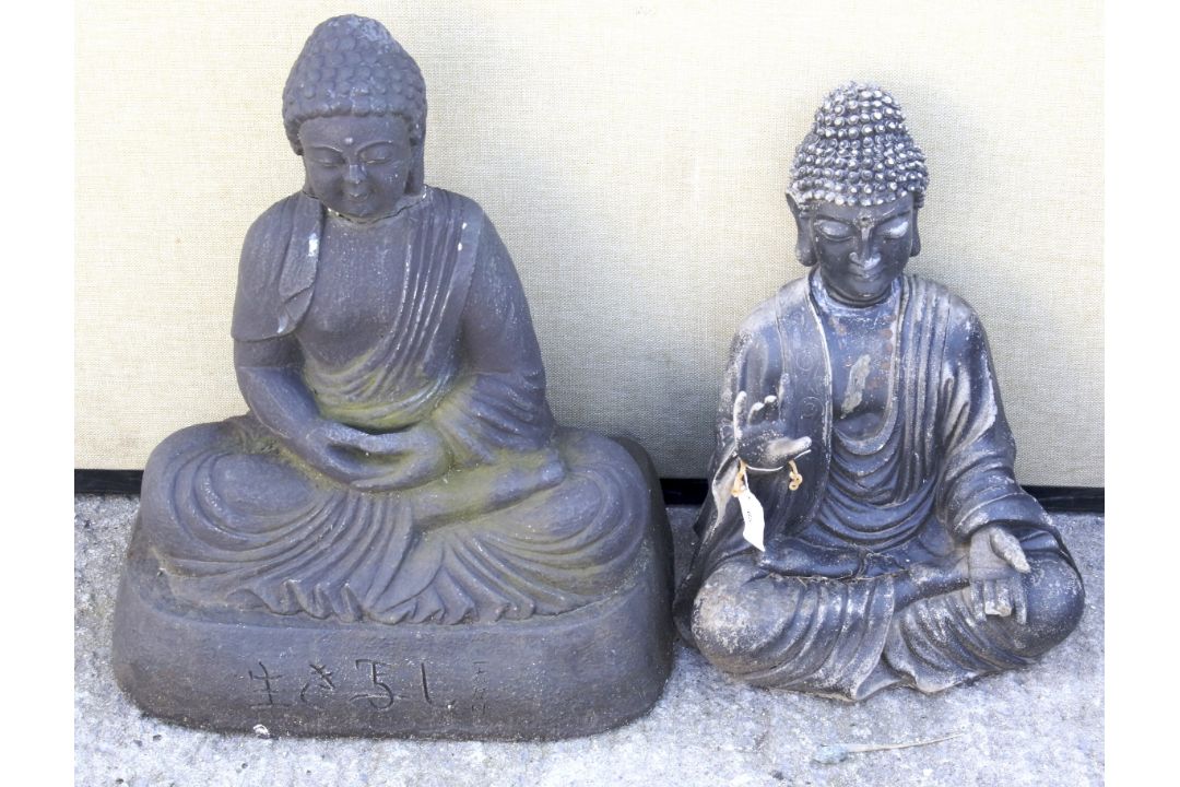 Two black painted ornamental garden Buddhas. Max.