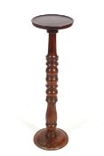 A early 20th century mahogany jardiniere stand.