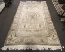 A 20th century large woollen rug.
