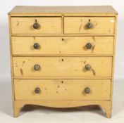 A vintage pine chest of drawers.