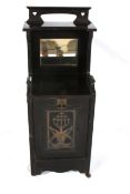 An ebonised Arts and Crafts style purdonium coal box.