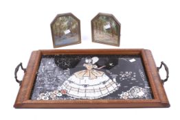 A pair of vintage bookends and a tray.