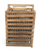 A vintage wooden apple store set of shelves.