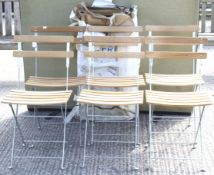 Ten foldable garden chairs.