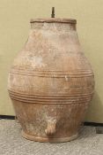 A large reconstituted stone baluster pot/vase.