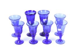 A set of six La Verrerie de Biot blue glass wine glasses and two others. Max.