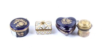 Four Limoges trinket boxes.