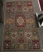 A vintage BMK Axmor Axminster wool mix rug.