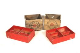 Two vintage Hall's Wine boxes and two red trays.