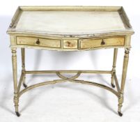 A Regency style serpentine desk.