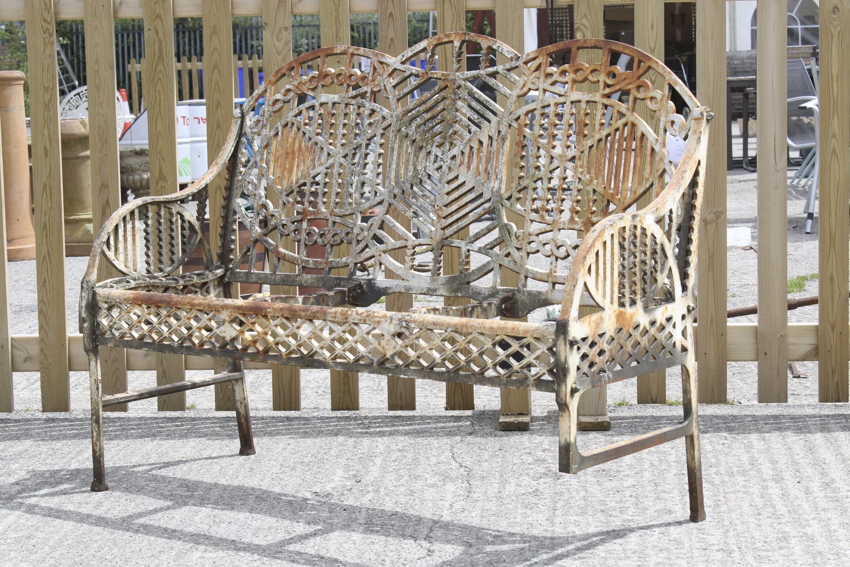 A mid 20th century cast iron garden bench designed by Edward Bawden for the Bilston Foundry. - Image 2 of 6