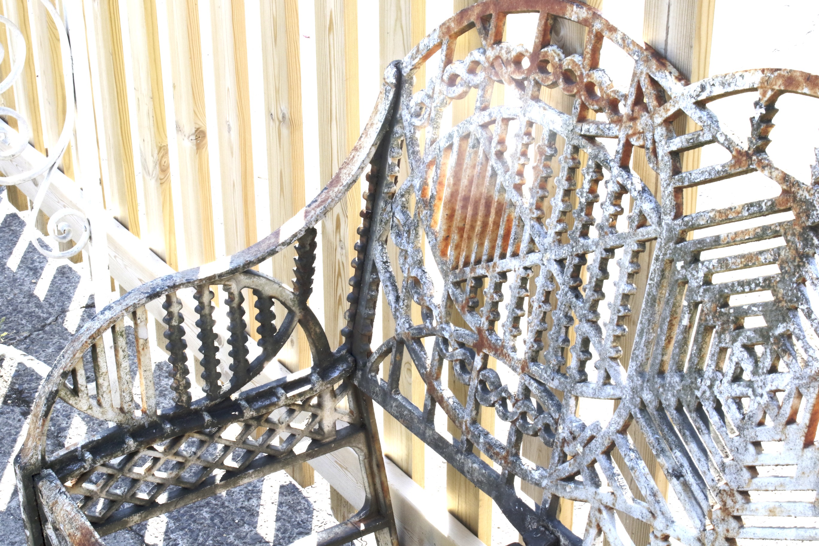 A mid 20th century cast iron garden bench designed by Edward Bawden for the Bilston Foundry. - Image 6 of 6