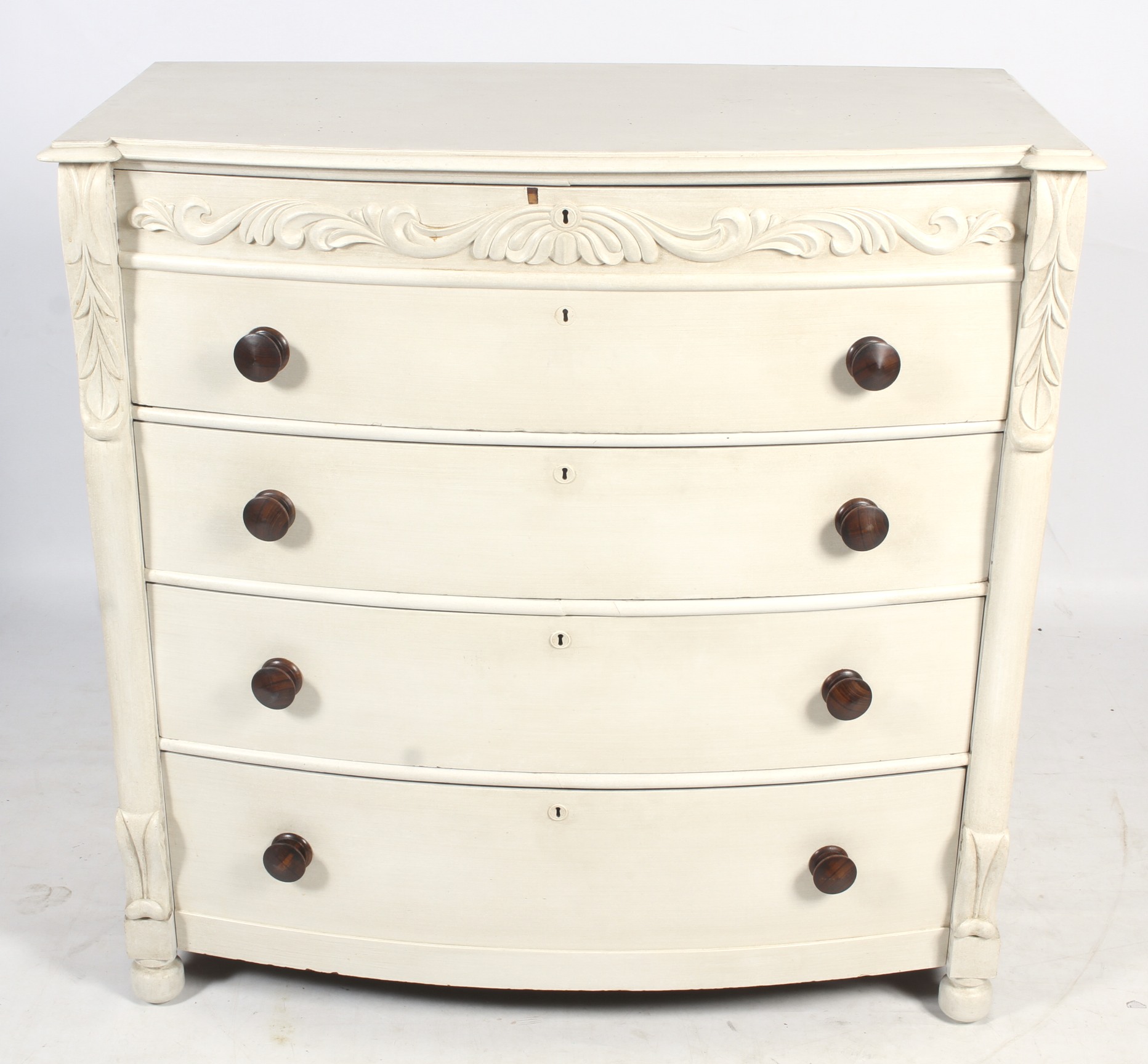 A 20th century painted mahogany bow front chest of drawers.