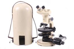 A Wild Heerbrugg M11 binocular microscope. Serial No. 59289. Ph 40 lens no. 11423; Ph 10 lens no.