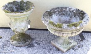 Two vintage reconstituted stone garden urn shaped planters.