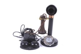 A 1920s candlestick telephone No.150 and bell.