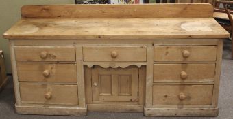 A Victorian pine breakfront sideboard / cupboard.