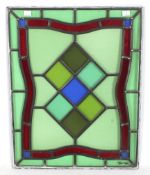 A contemporary stained glass leaded panel by John Yeo.