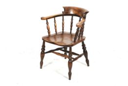 A vintage smoker's bow chair.