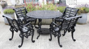 A brand new solid cast aluminium Victorian style round table and Sandringham four chairs.