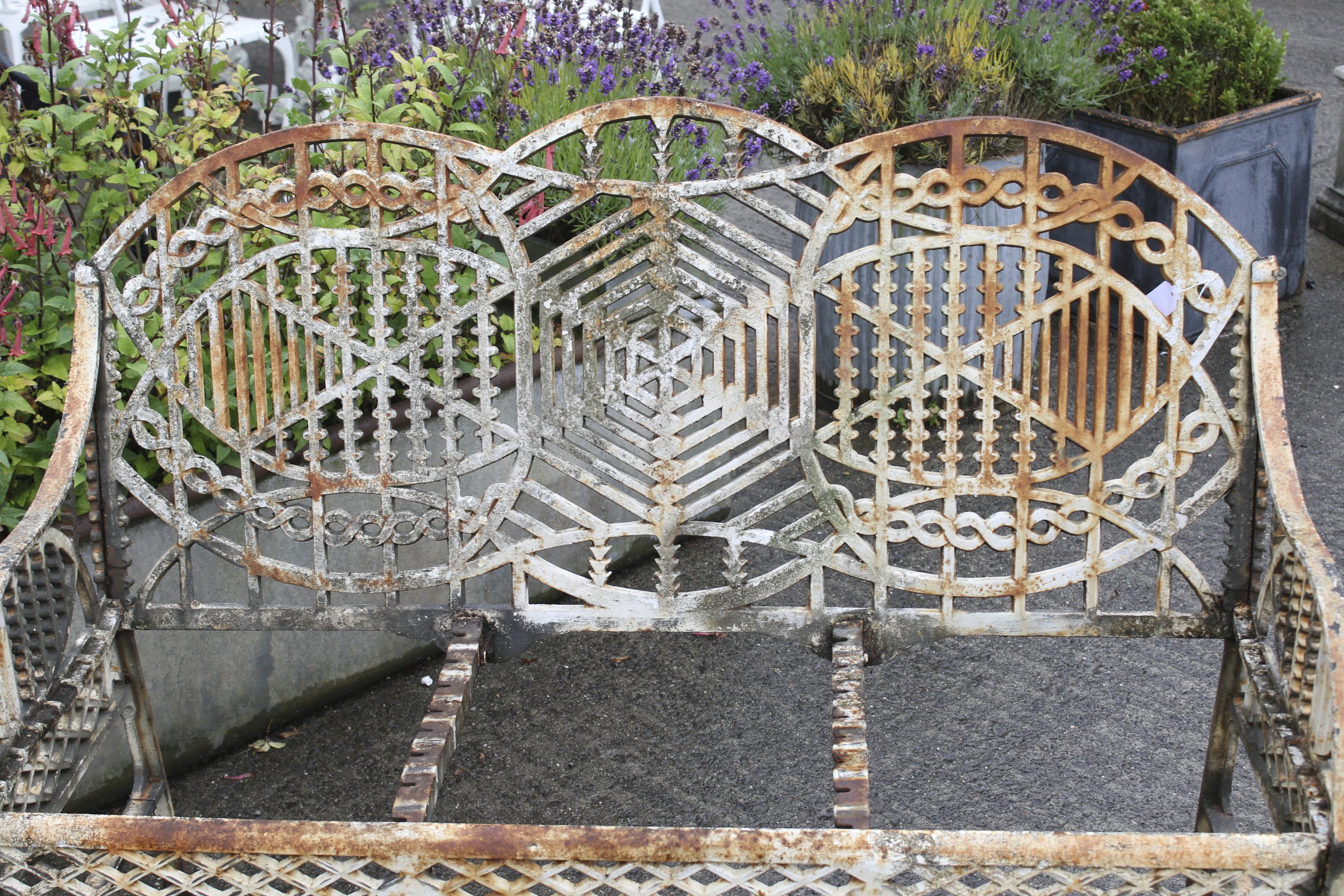 A mid 20th century cast iron garden bench designed by Edward Bawden for the Bilston Foundry. - Image 3 of 6