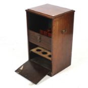 An oak tambour fronted cabinet.