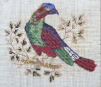 A needlepoint and bead work picture. Depicting a colourful bird, 22cm x 25.