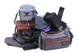 A large assortment of camera and photographic accessories.