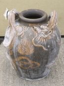 A large Oriental baluster shaped garden urn.
