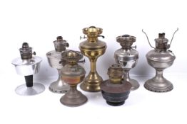 Seven oil lamp bases.