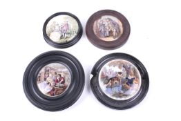 A group of four assorted framed Prattware pot lids. Including 'Uncle Toby', various sizes. Max.