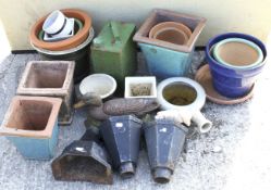 An assortment of garden pots and collectables. Including a blue glazed tapered pot.