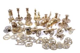 An assortment of 19th century and later brassware.
