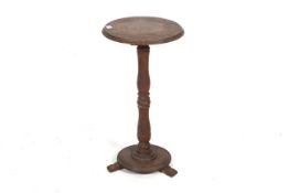 An oak occasional table.