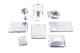 Seven silver smoking related items.