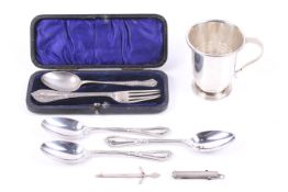 A small collection of silver including an Art Deco silver christening mug.