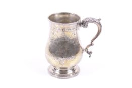 A Victorian silver baluster shaped mug.