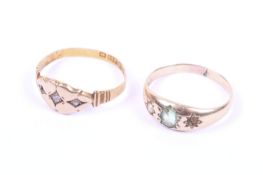 Two late Victorian and later gold and gem set gypsy rings.