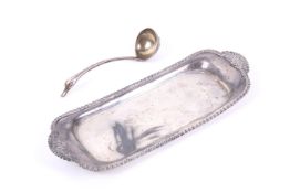 A George III silver oblong snuffers tray and a bird's head sauce ladle.