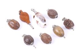 A small collection of naturalistic propelling pencils including five in the form of a nut.